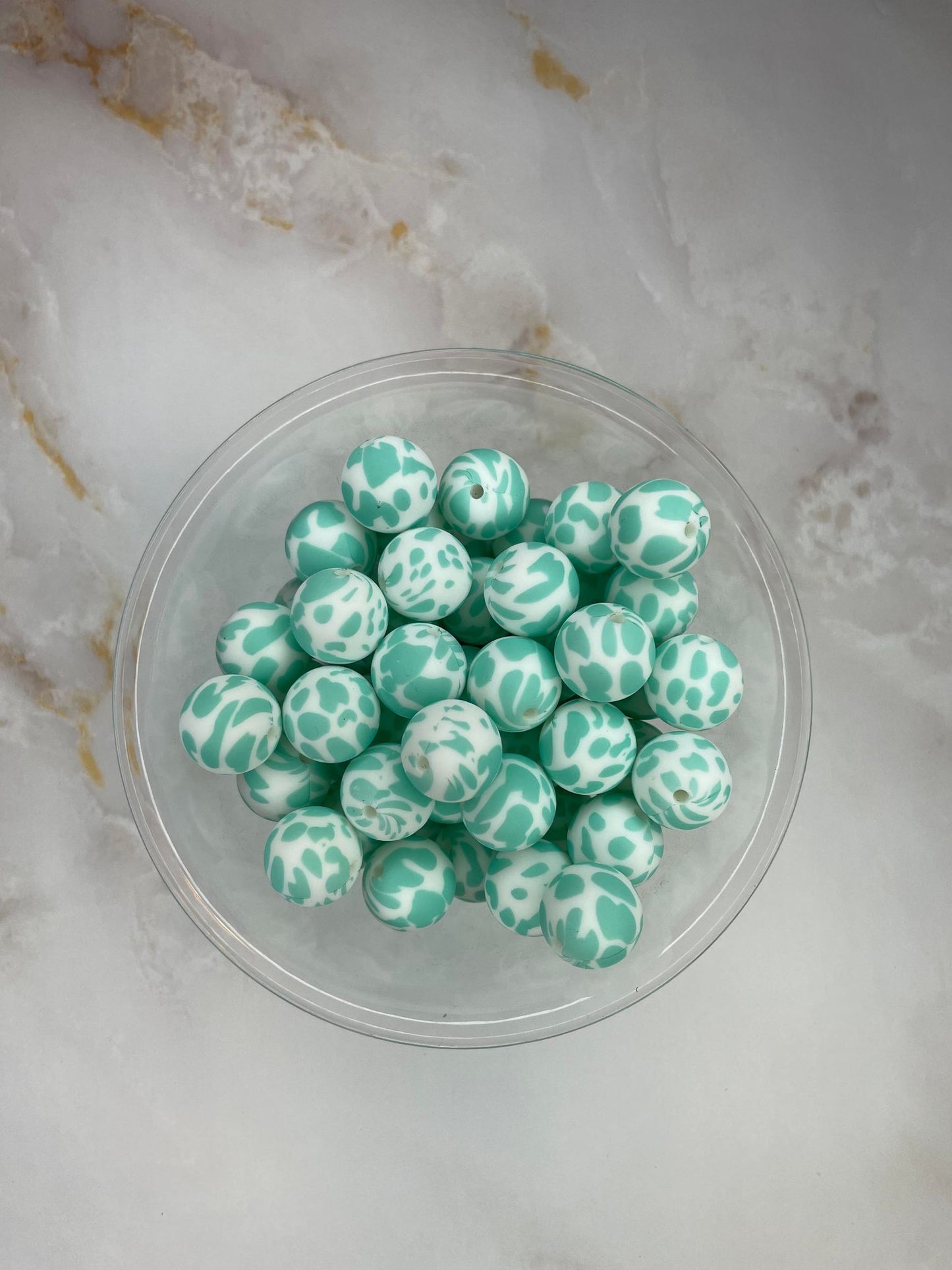 P171 TURQUOISE COW 15MM PRINT (10ct)